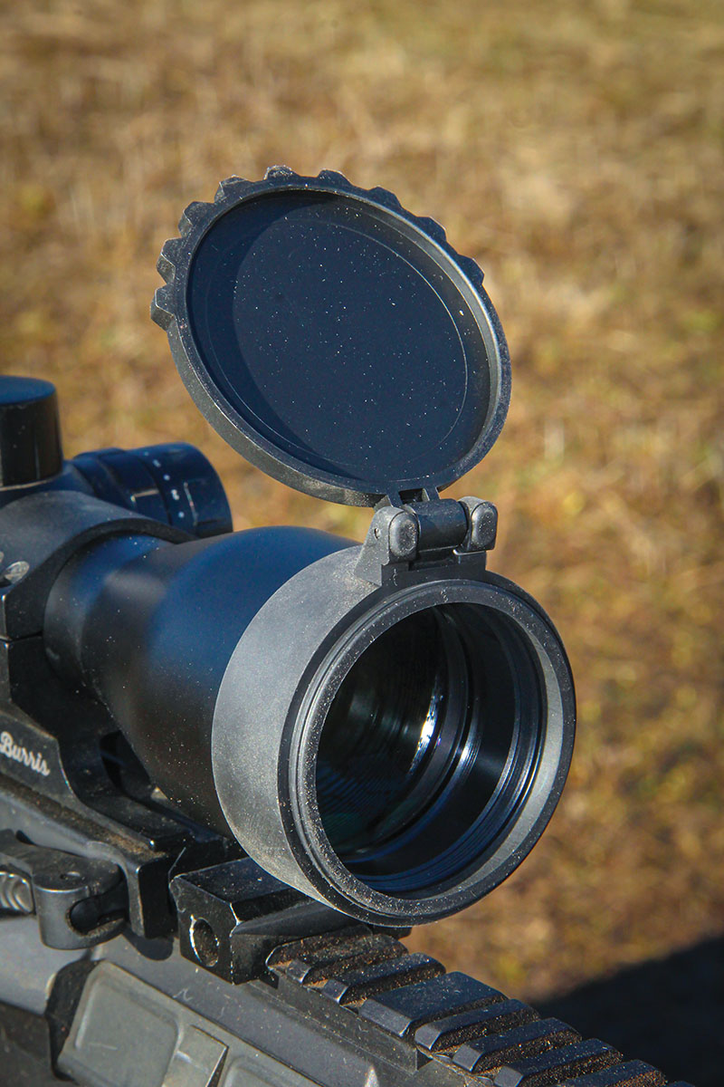 The new Predator 4s comes with objective- and ocular-mounted spring-loaded/flip-up lens  covers. They include a bottom-serrated edge to make deploying them in a hurry easy, even while wearing gloves.